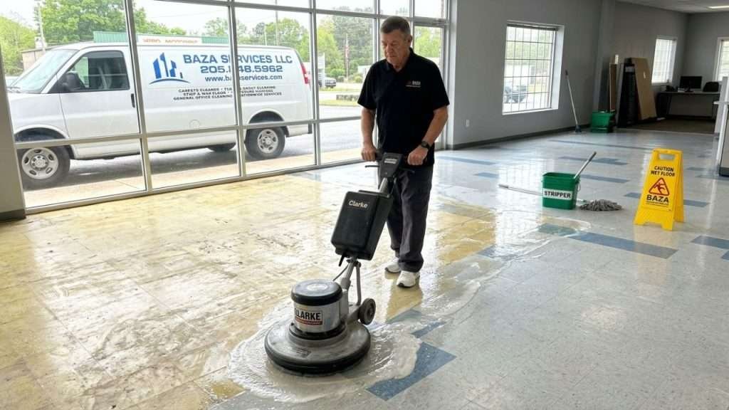 Professional floor stripping process removing old wax in Birmingham